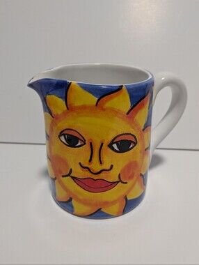 Starbucks "Ciao Italia" collection by Bellini and features a sunny face design.